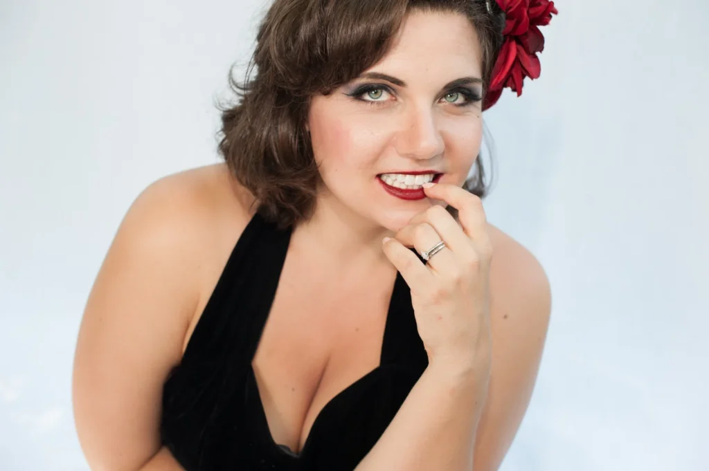 Smiling portrait against a pale background