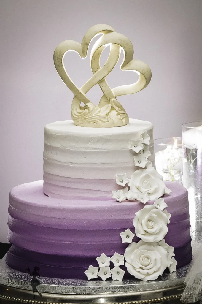 Wedding cake with a heart shaped topper