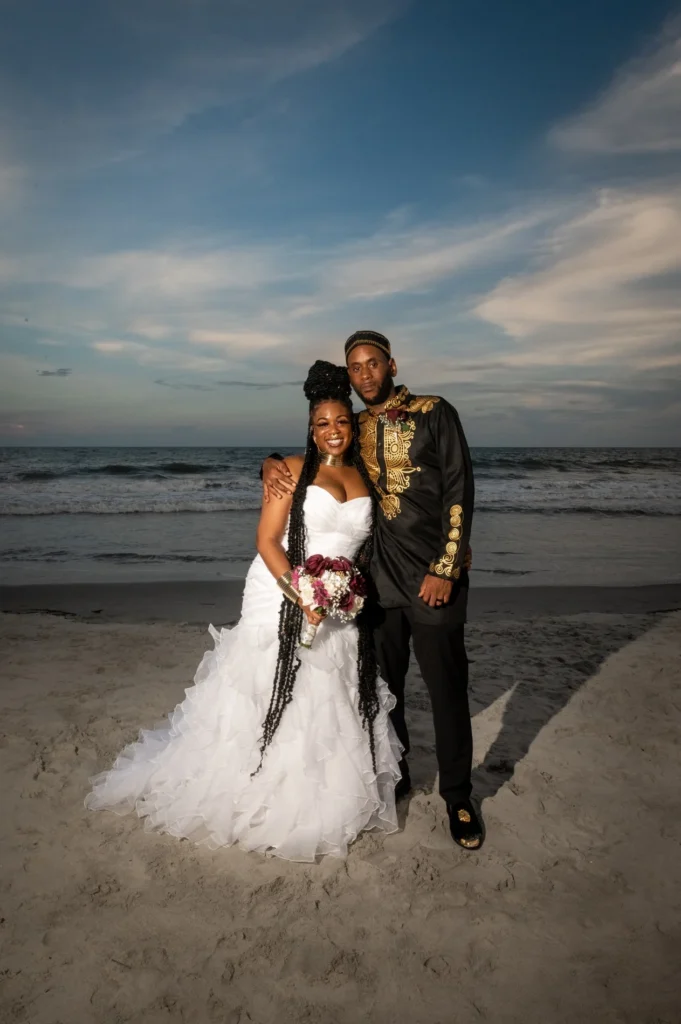 Wedding couple together at the shoreline