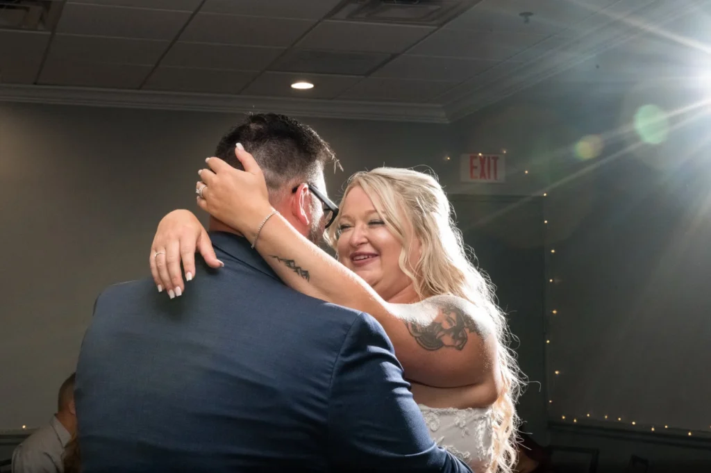 Bride and groom looking at each other during their first dance